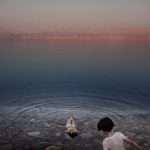 Palestinian girls floating in the waters of the Dead Sea. Palestine 2009.